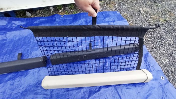 Volvo V60 & Volvo V70 cargo net for wagon models light cream & black colours available   Part Numbers: 9928200018 & 9928200019