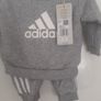 New baby boy bundle with tags .Consists of Addidas tracksuit . Name it top .Hat and gloves .pack of 7 pair socks .2 pair of rattle socks and free sunhat new  and green cable jumper all new  17 euro the lot Image 2