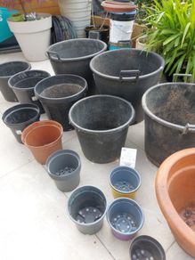 Bundle of various garden planter pots.