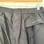 Trespass waterproof trousers, unisex, size L, black, pack away size Image 5