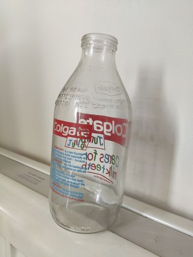 Unigate 1980s milk bottle Colgate