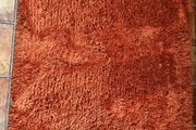 Kukoon terracotta/cinnamon colour shaggy rug 120 x170 cm