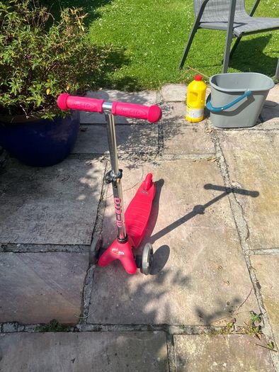 Young child's light up wheel scooter.