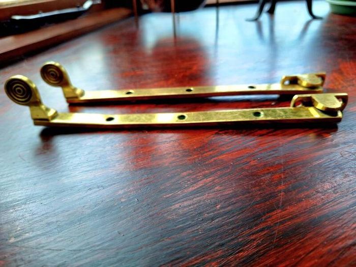 Vintage brass window stays