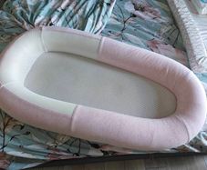 Purflo Sleep Tight Baby Bed with a spare cover