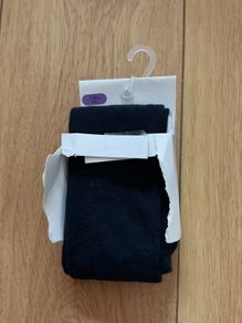 Girls navy tights age 7-8