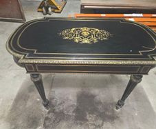 A 19th Century French Ebonised and Brass inlay and Metal Mounted Table with Drawer