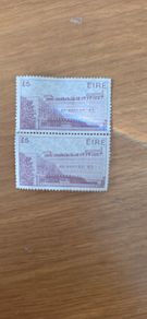 A pair of 5 pound Irish postage stamps depicting Busaras