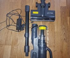 MUIZZY Bagless vacuum