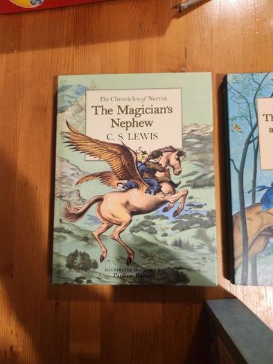 The Chronicals Of Narnia Compilation.  2 Books In Presentation Folder. Large Volume Hardback In Very Good Condition.