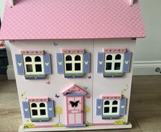wooden dolls house with furniture & figures