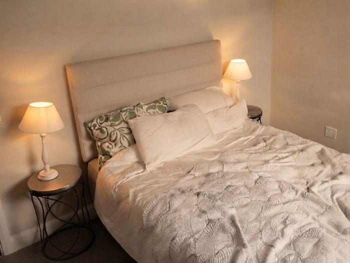 King size bed + headboard + mattress + bedside tables + lamps