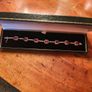 Stg silver bracelet, ruby and diamond colour gemstones Image 9