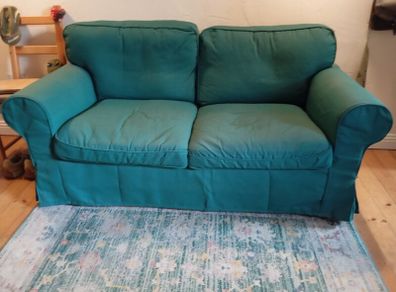 Dark green 2 seater couch in perfect condition