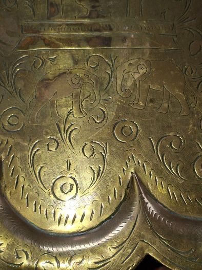 Antique Brass Charger Tray Hand-Engraved Mughal court figures. The Charger has a distinct Scalloped edge and is heavily decorated. Similar items often date from the late 19th century, specifically around the 1870s or 1880s