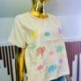 Textured cotton-linen blend top with prints and a cute little pocket detail. Pair it with your favorite denim shorts for an instant casual-cool look. Image 2