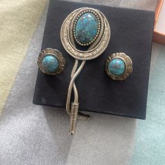 Vintage Southwestern bolo tie set with matching turquoise-style earrings. Silver-tone metal, Western/boho style, good vintage condition.