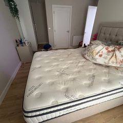 2 year old King size Mattress almost like new no stains with topper already