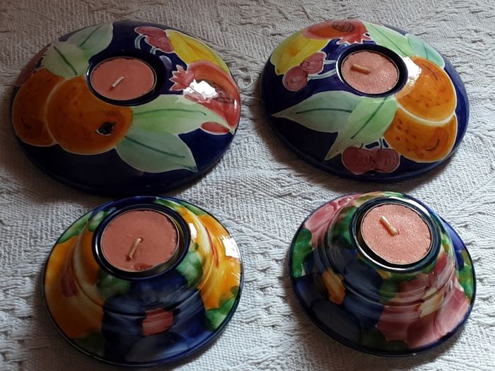 set of four tea light holder's