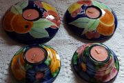 set of four tea light holder's