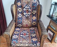 Indoor wicker armchair