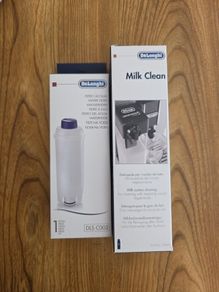 Delonghi. 1 x water filter. 1 x milk clean