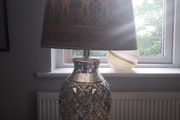 A contemporary mercury glass lamp