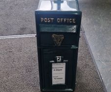 New cast iron green post box