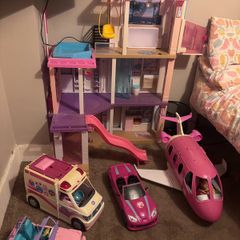 Barbie Dream house, camper van, ambulance sports car and plane