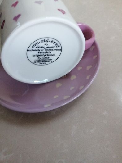 Considered by Helen James mug on plate