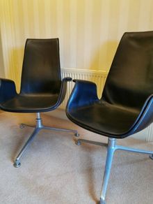 Pair of original Walter Knoll swivel bucket chairs.