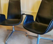 Pair of original Walter Knoll swivel bucket chairs.