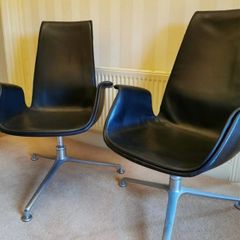 Pair of original Walter Knoll swivel bucket chairs.
