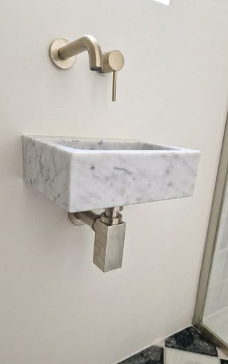 Cararra marble wall mounted sink