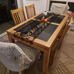 Solid oak dining table and 6 chairs