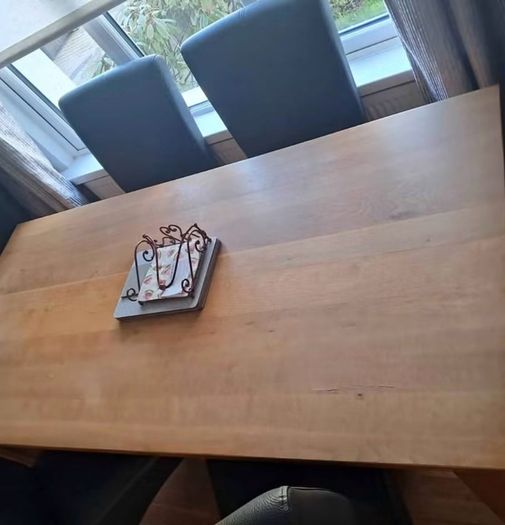 Oak dining table and chairs