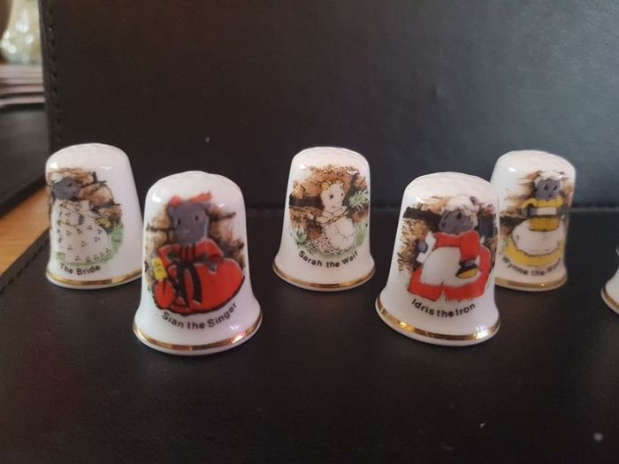 Collection of Thimbles Animals doing Household Chores