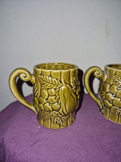 Vintage Japanese green embossed ceramic pair of mugs and milk jug