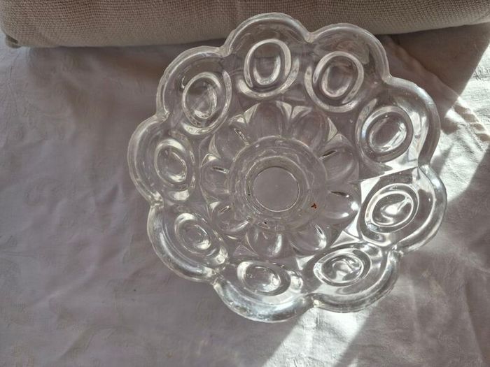 A vintage pressed glass footed bowl.