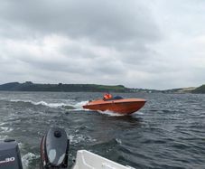 Sharp 19 with Yamaha F150 and trailer
