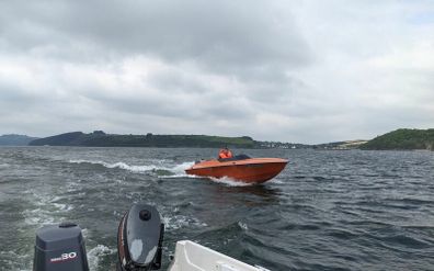 Sharp 19 with Yamaha F150 and trailer