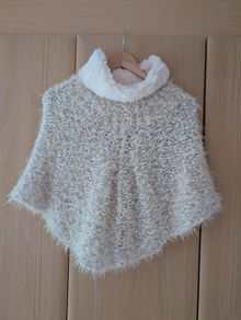 Hand knitted poncho