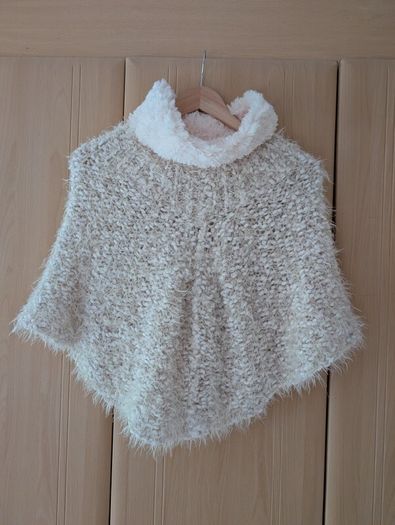 Hand knitted poncho
