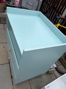Baby changing press
