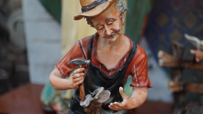 Porcelain Figurine - Shoemaker at Work
