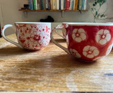 Four decorative cups