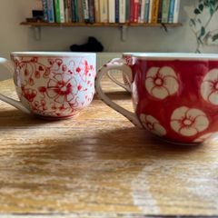 Four decorative cups