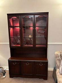 Rossmore Mahoney glass display unit, with light