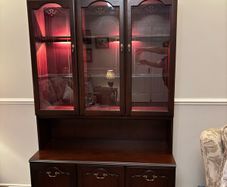Rossmore Mahoney glass display unit, with light