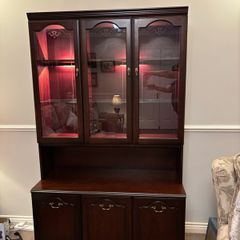 Rossmore Mahoney glass display unit, with light